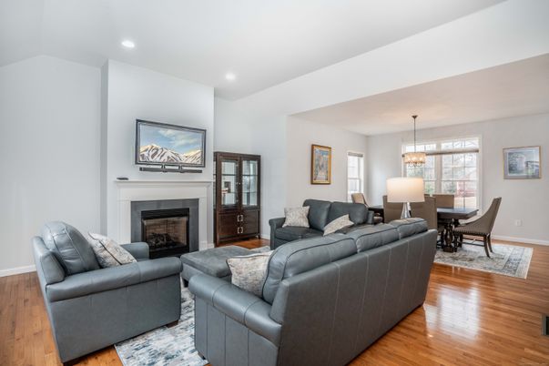 Chandelier, Dining room, Fireplace, Interior, Living room, Recessed Lighting, Wood Texture Flooring