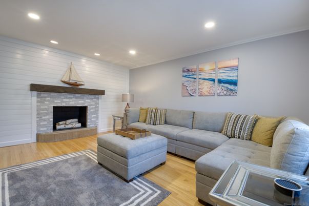 Fireplace, Interior, Living room, Recessed Lighting, Wood Texture Flooring