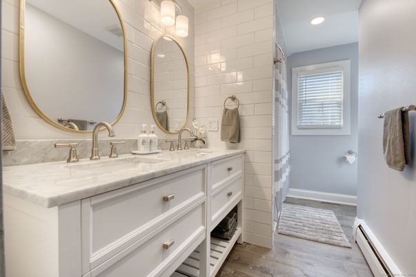 Bathroom, Dual Sink Vanities, Interior, Recessed Lighting, Wood Texture Flooring