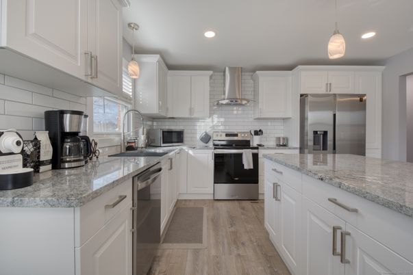 Interior, Kitchen, Pendant Lights, Recessed Lighting, Stainless Steel Appliances, Wood Texture Flooring