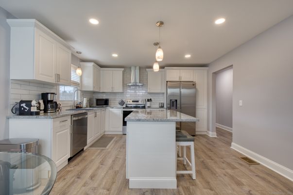 Interior, Kitchen, Pendant Lights, Recessed Lighting, Stainless Steel Appliances, Wood Texture Flooring