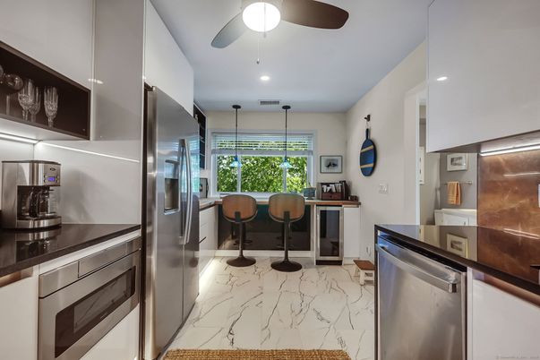 Dining room, Interior, Kitchen, Marble, Pendant Lights, Recessed Lighting, Stainless Steel Appliances