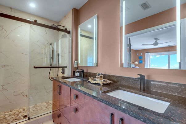 Bathroom, Dual Sink Vanities, Glass Shower, Interior, Marble Walls, Recessed Lighting