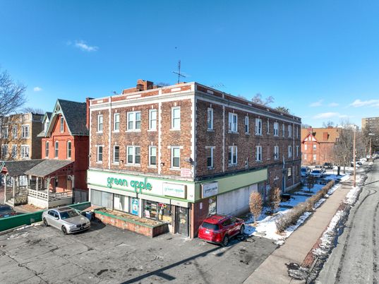 Exterior, Facade, Brick Facade, Condo Building