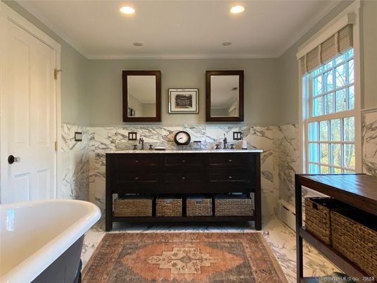 Bathroom, Dual Sink Vanities, Free Standing Baths, Interior, Marble, Marble Walls, Recessed Lighting