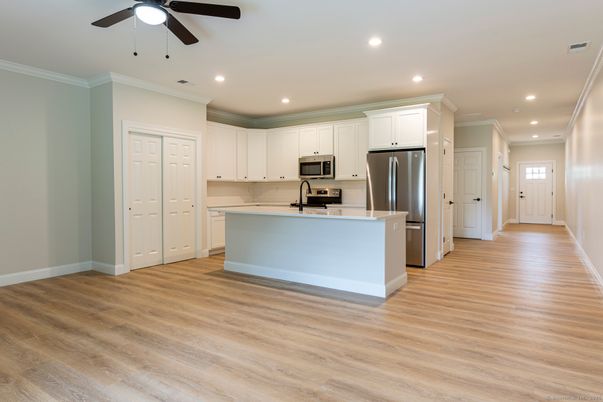 Interior, Kitchen, Recessed Lighting, Stainless Steel Appliances, Wood Texture Flooring