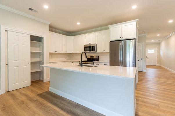 Interior, Kitchen, Recessed Lighting, Stainless Steel Appliances, Wood Texture Flooring