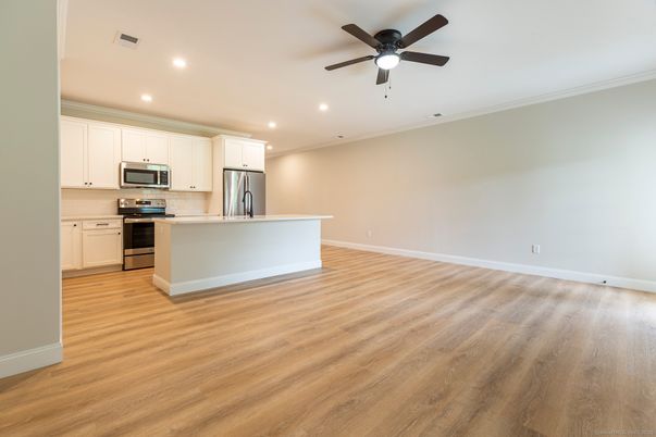 Interior, Kitchen, Recessed Lighting, Stainless Steel Appliances, Wood Texture Flooring