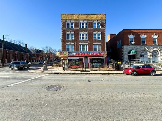 Exterior, Facade, Brick Facade, Condo Building
