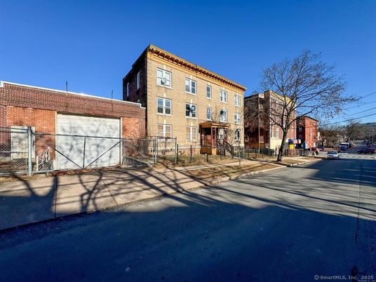 Attached, Exterior, Facade, Brick Facade, Rowhouse