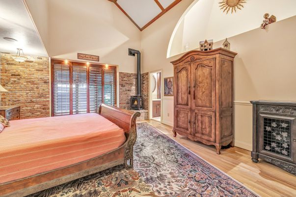 Bedroom, Fireplace, Interior, Stone Walls, Wood Texture Flooring