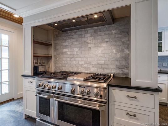 Interior, Kitchen, Recessed Lighting, Stainless Steel Appliances, Stone Walls