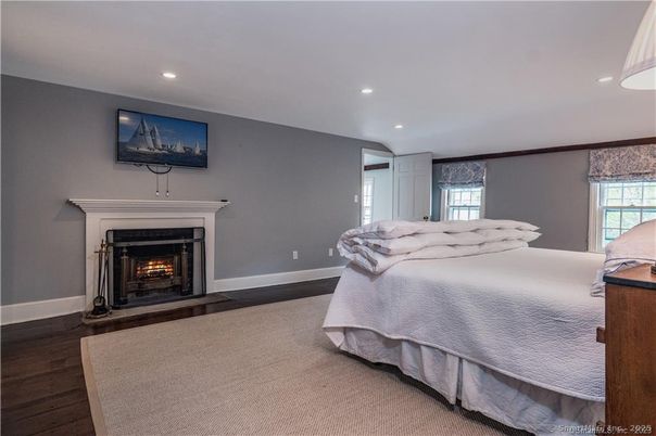 Bedroom, Fireplace, Interior, Recessed Lighting, Wood Texture Flooring