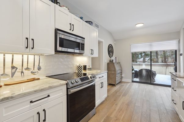 Interior, Kitchen, Recessed Lighting, Stainless Steel Appliances, Wood Texture Flooring