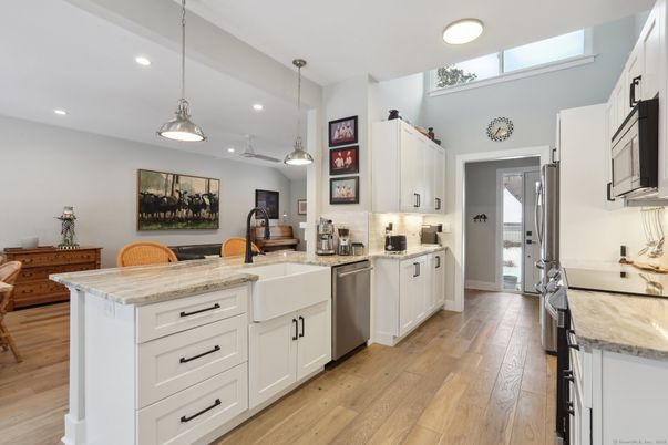 Interior, Kitchen, Pendant Lights, Recessed Lighting, Stainless Steel Appliances, Wood Texture Flooring