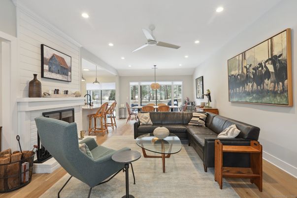 Dining room, Fireplace, Interior, Living room, Pendant Lights, Recessed Lighting, Wood Texture Flooring