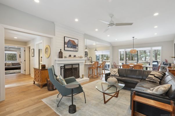 Dining room, Fireplace, Interior, Living room, Pendant Lights, Recessed Lighting, Wood Texture Flooring