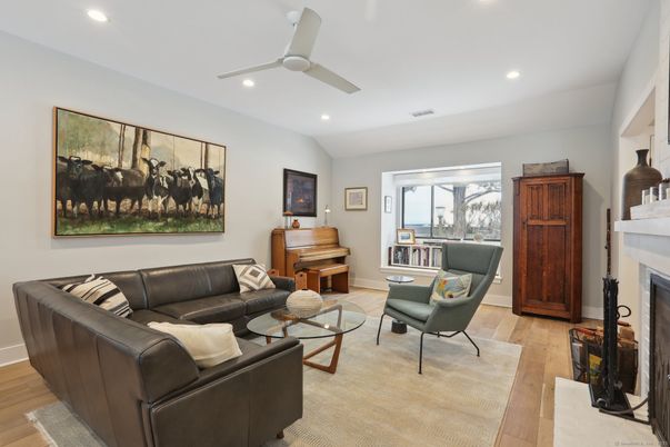 Fireplace, Interior, Living room, Piano, Recessed Lighting, Wood Texture Flooring