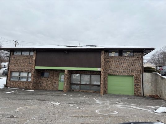 Attached, Exterior, Facade, Brick Facade, Modern