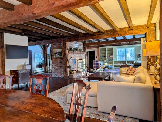 Dining room, Fireplace, Interior, Living room, Stone Walls, Wooden Beams, Wood Texture Flooring