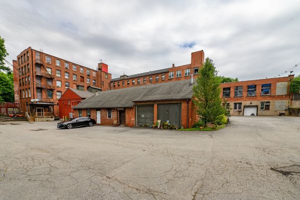 Attached, Exterior, Facade, Brick Facade, Condo Building