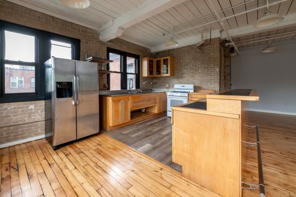 Interior, Kitchen, Pendant Lights, Stainless Steel Appliances, Stone Walls, Wood Texture Flooring