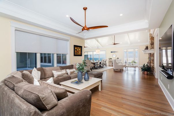 Dining room, Fireplace, Interior, Living room, Pendant Lights, Recessed Lighting, Wood Texture Flooring