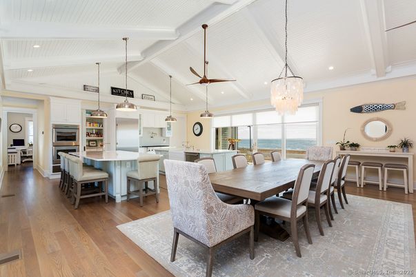 Chandelier, Dining room, Interior, Kitchen, Pendant Lights, Recessed Lighting, Stainless Steel Appliances, Water, Wood Texture Flooring