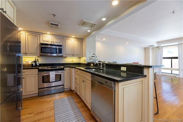 Interior, Kitchen, Recessed Lighting, Stainless Steel Appliances, Wood Texture Flooring