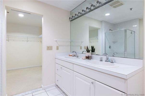 Bathroom, Dual Sink Vanities, Glass Shower, Interior, Recessed Lighting, Walk-in Closets