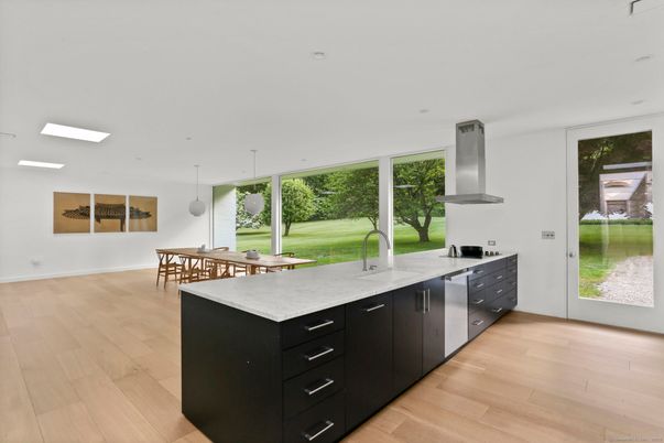 Dining room, Interior, Kitchen, Pendant Lights, Recessed Lighting, Stainless Steel Appliances, Wood Texture Flooring