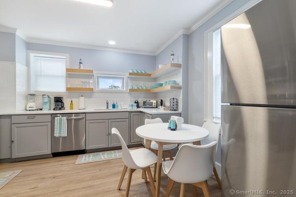 Dining room, Interior, Kitchen, Recessed Lighting, Stainless Steel Appliances, Wood Texture Flooring