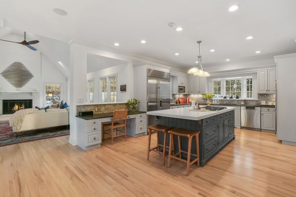 Fireplace, Interior, Kitchen, Living room, Pendant Lights, Recessed Lighting, Stainless Steel Appliances, Wood Texture Flooring