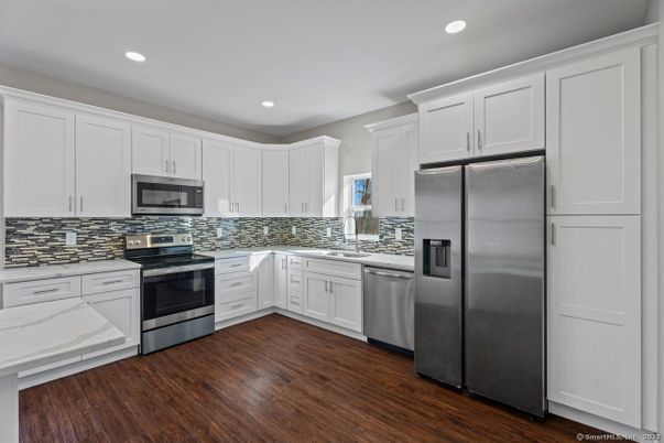 Interior, Kitchen, Recessed Lighting, Stainless Steel Appliances, Wood Texture Flooring