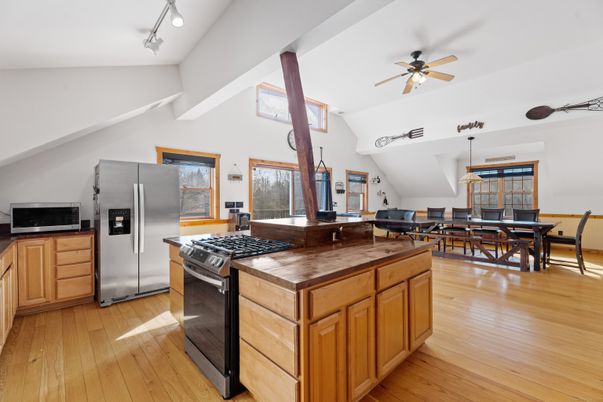 Dining room, Interior, Kitchen, Pendant Lights, Stainless Steel Appliances, Wood Texture Flooring