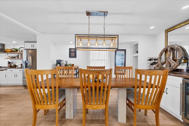 Dining room, Interior, Kitchen, Pendant Lights, Recessed Lighting, Stainless Steel Appliances, Wood Texture Flooring