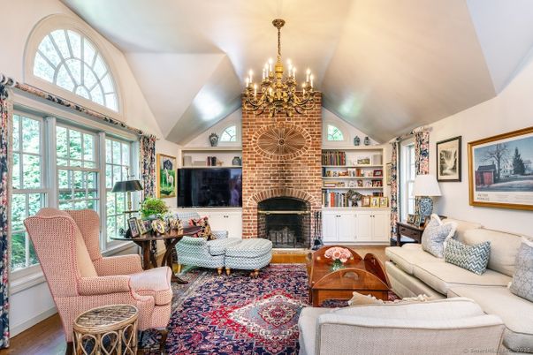 Chandelier, Fireplace, Interior, Living room, Stone Walls, Wood Texture Flooring