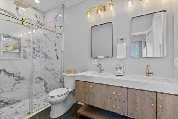 Bathroom, Dual Sink Vanities, Glass Shower, Interior, Marble Walls, Recessed Lighting