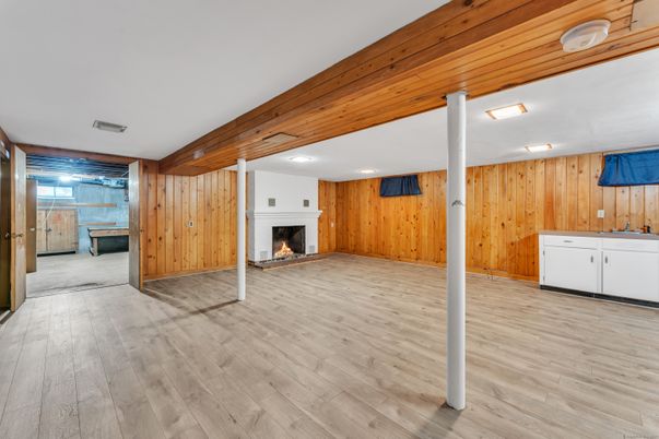 Empty room, Fireplace, Interior, Recessed Lighting, Wood Texture Flooring, Wooden Walls