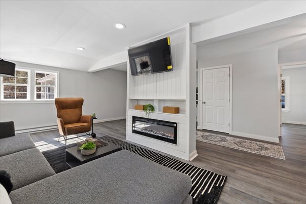 Fireplace, Interior, Living room, Recessed Lighting, Wood Texture Flooring
