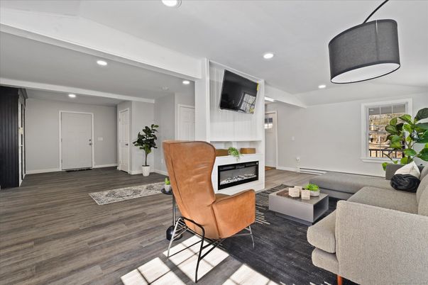 Fireplace, Interior, Living room, Recessed Lighting, Wood Texture Flooring