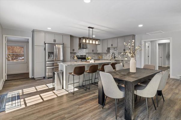 Dining room, Interior, Kitchen, Pendant Lights, Recessed Lighting, Stainless Steel Appliances, Wood Texture Flooring