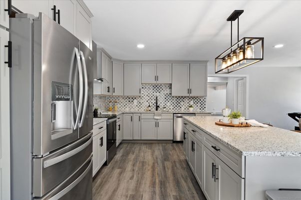 Interior, Kitchen, Pendant Lights, Recessed Lighting, Stainless Steel Appliances, Wood Texture Flooring