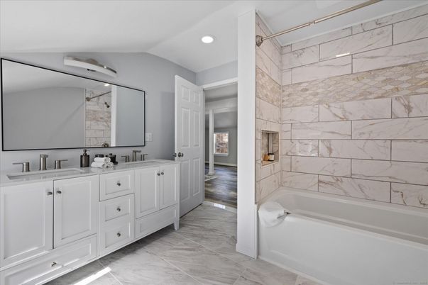 Bathroom, Dual Sink Vanities, Interior, Marble, Marble Walls, Recessed Lighting