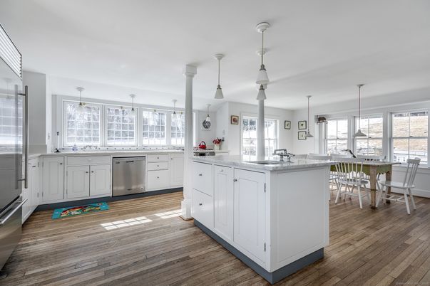 Dining room, Interior, Kitchen, Pendant Lights, Stainless Steel Appliances, Wood Texture Flooring