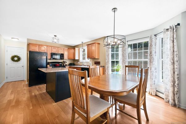 Dining room, Interior, Kitchen, Pendant Lights, Stainless Steel Appliances, Wood Texture Flooring