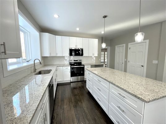 Interior, Kitchen, Pendant Lights, Recessed Lighting, Stainless Steel Appliances, Wood Texture Flooring
