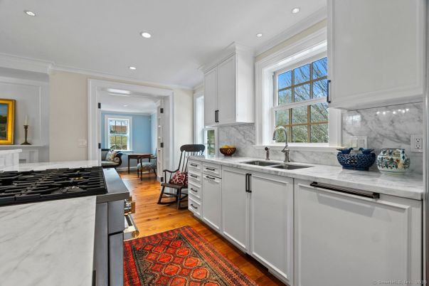 Dining room, Interior, Kitchen, Marble Walls, Recessed Lighting, Stainless Steel Appliances, Wood Texture Flooring