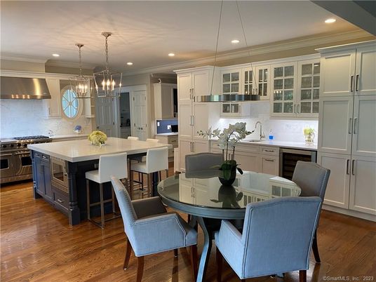 Dining room, Interior, Kitchen, Pendant Lights, Recessed Lighting, Stainless Steel Appliances, Wood Texture Flooring
