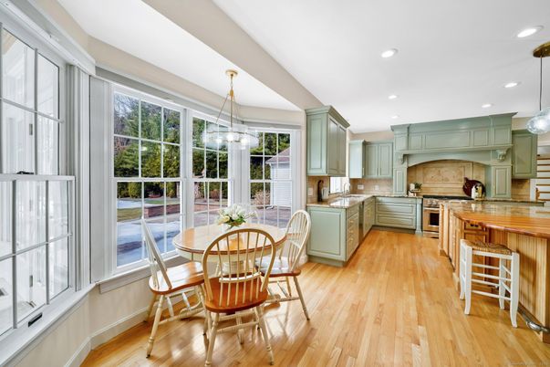 Dining room, Interior, Kitchen, Pendant Lights, Recessed Lighting, Stainless Steel Appliances, Wood Texture Flooring